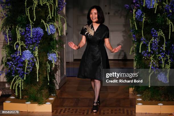 Designer Guo Pei walks the runway during the Guo Pei Haute Couture Fall/Winter 2017-2018 show as part of Haute Couture Paris Fashion Week on July 2,...