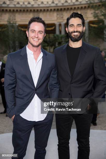 Actors Ryan Kelley and Tyler Hoechlin arrive for the amfAR Paris Dinner at Le Petit Palais on July 2, 2017 in Paris, France.