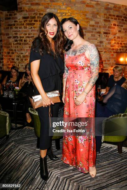 German presenter Alexandra Polzin and German presenter Lina van de Mars during the host of Annabelle Mandengs Ladies Dinner at Hotel Zoo on July 2,...