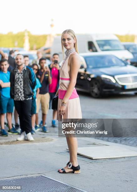 Chiara Ferragni wearing sandals, dress and clutch outside Miu Miu Cruise Collection during Paris Fashion Week - Haute Couture Fall/Winter 2017-2018 :...