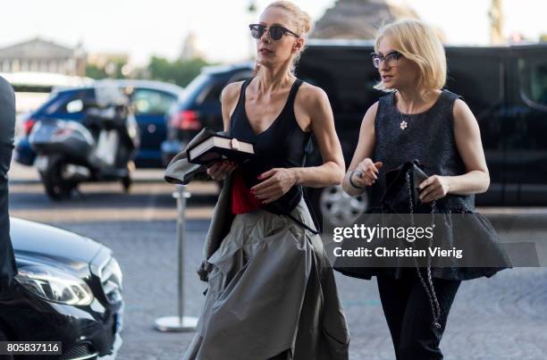 Elina Halimi outside Miu Miu Cruise Collection during Paris Fashion Week - Haute Couture Fall/Winter 2017-2018 : Day One on July 2, 2017 in Paris,...