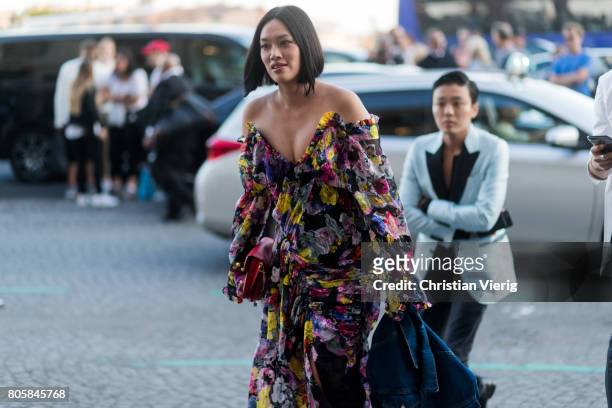 Tiffany Hsu wearing an off shoulder dress outside Miu Miu Cruise Collection during Paris Fashion Week - Haute Couture Fall/Winter 2017-2018 : Day One...