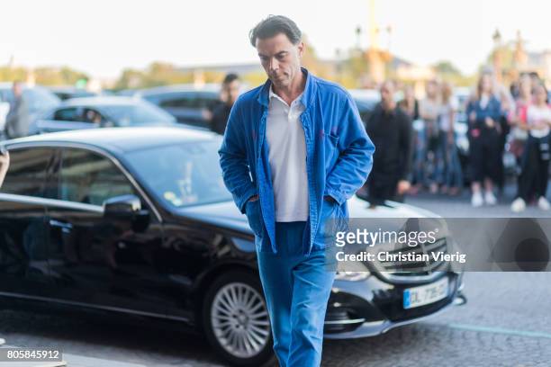 Guest outside Miu Miu Cruise Collection during Paris Fashion Week - Haute Couture Fall/Winter 2017-2018 : Day One on July 2, 2017 in Paris, France.