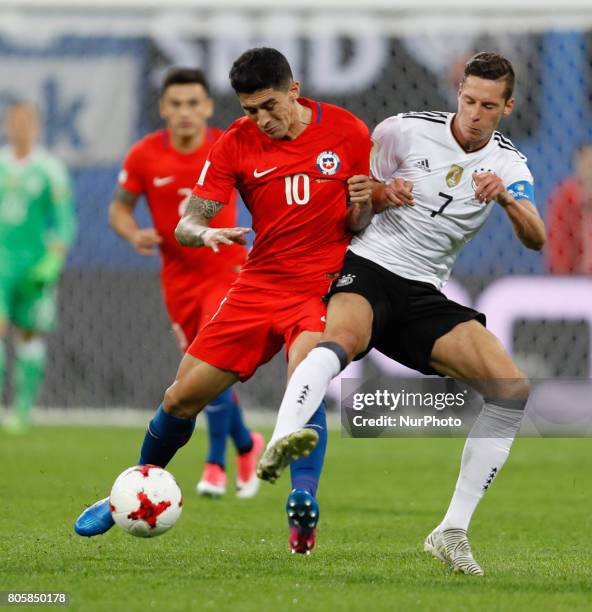 Pablo Hernandez of Chile national team and Julian Draxler of Germany national team vie for the ball during FIFA Confederations Cup Russia 2017 final...