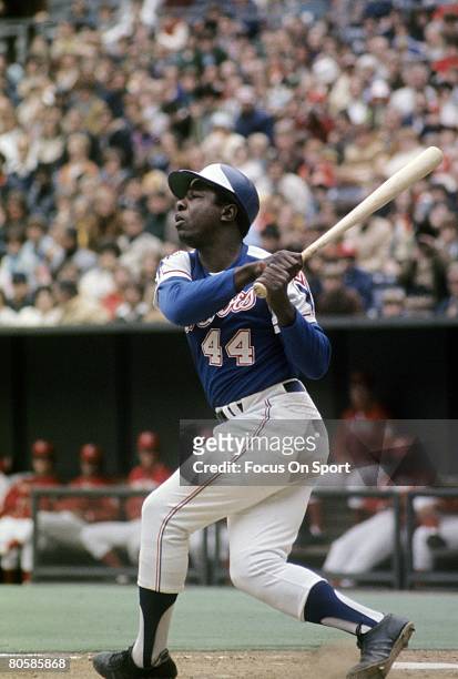 S: Outfielder Hank Aaron of the Atlanta Braves swings and watches the flight of his ball against the Cincinnati Reds during a circa mid 1960's Major...