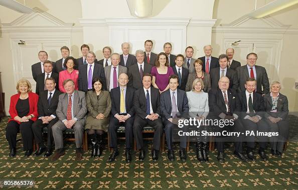 Members of the British government shadow cabinet pose for a family