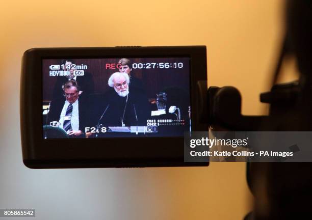 The Archbishop of Canterbury Dr Rowan Williams, seen through a video camera viewfinder, as he delivers his presidential address to the General Synod...