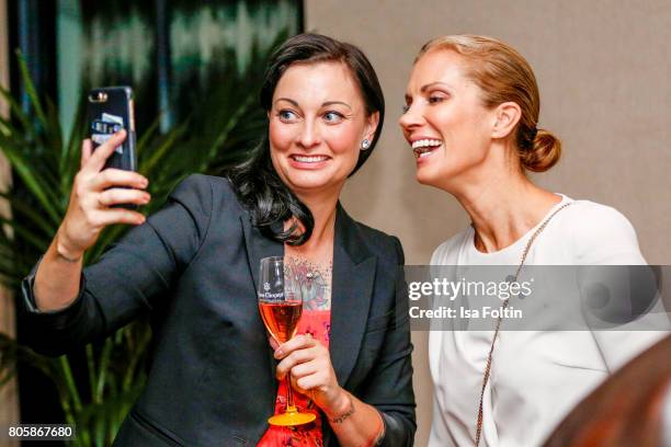 German presenter Lina van de Mars and German presenter Kerstin Linnartz during the host of Annabelle Mandengs Ladies Dinner at Hotel Zoo on July 2,...