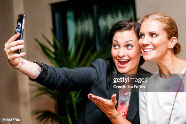 German presenter Lina van de Mars and German presenter Kerstin Linnartz during the host of Annabelle Mandengs Ladies Dinner at Hotel Zoo on July 2,...