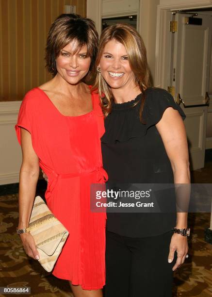 Actors Lisa Rinna and Lori Loughlin arrive at Saks Fifth Avenue's 20th Annual Spring Luncheon at the Beverly Wilshire Hotel on April 9, 2008 in...