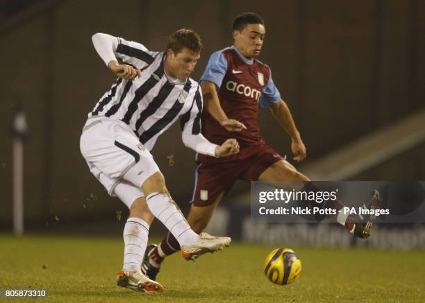 West Bromwich Albion's Chris Wood shoots past Aston Villa defender Derrick Williams