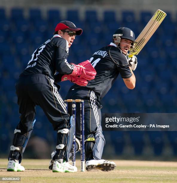 England's Kevin Pietersen hits out watched by England Lions wicketkeeper Craig Kieswetter during International Twenty20 Friendly at the Dubai Sports...