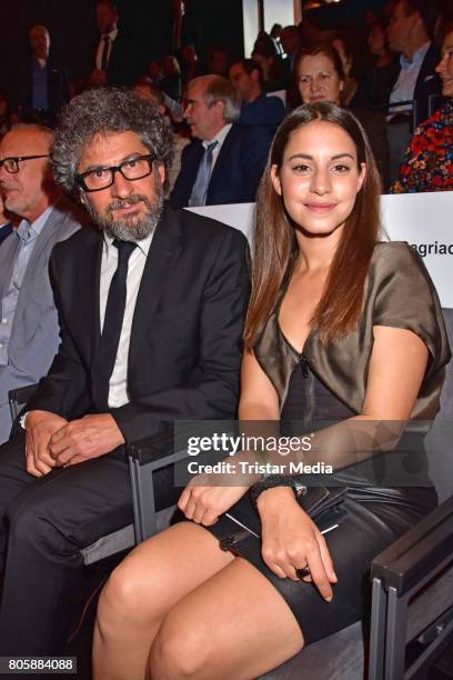 Radu Mihaileanu and Almila Bagriacik attend the Opening Gala Of The 23. Jewish Film Festival Berlin And Brandenburg 2017 at Hans Otto Theater on July...