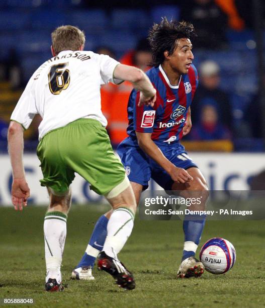 Crystal Palace's Nick Carle looks to get past Reading's Brynjar Gunnarsson during the Coca-Cola Championship match at Selhurst Park, London.