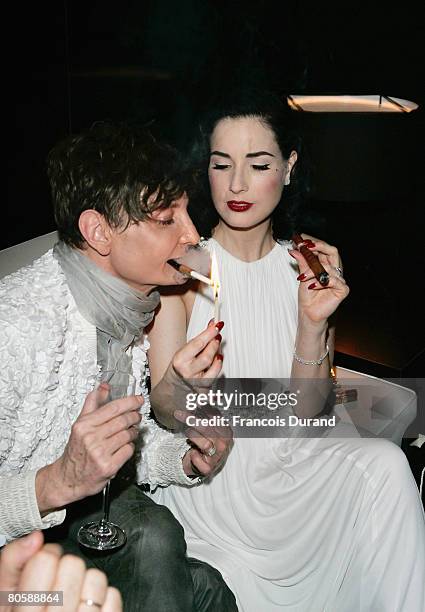 Burlesque artist Dita von Teese and guest attend the 'Writing Time', Robert Wilson's watch launch gala hosted by Montblanc during the Salon...