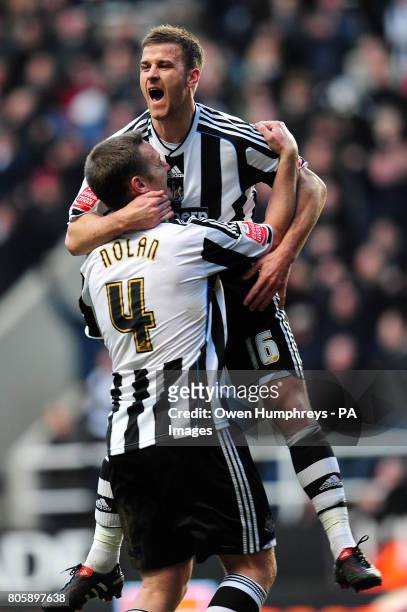 Newcastle's Ryan Taylor celebrates his side third goal with Kevin Nolan during the Coca-Cola Championship match at St James' Park, Newcastle.