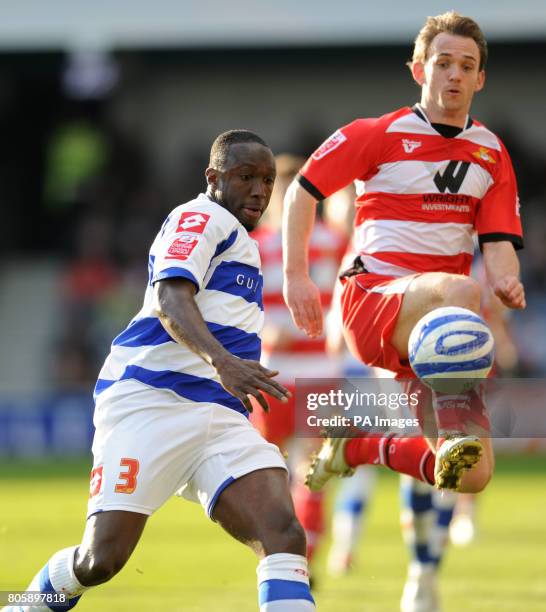 Queens Park Rangers' Damion Stewart and Doncaster Rovers' James Hayter during the Coca-Cola Championship match at Loftus Road, London.