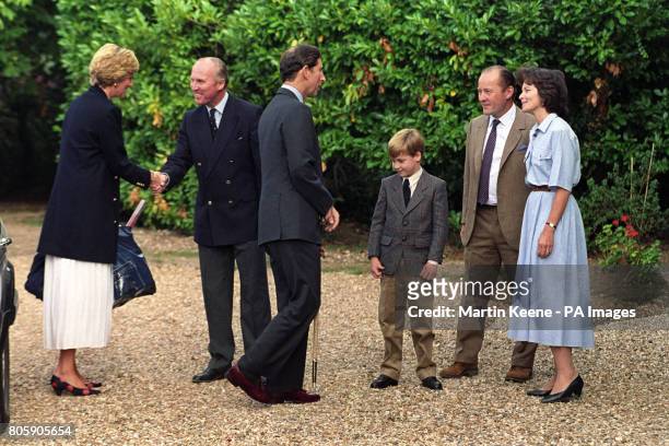 Prince William is welcomed to Ludgrove Preparatory School near Wokingham, Berkshire by joint headmaster Nichol Marston and Janet Barber, wife of the...