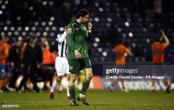 West Bromwich Albion keeper Scott Carson makes his way off after defeat in the FA Cup Fifth Round Replay match at The Hawthorns, West Bromwich.