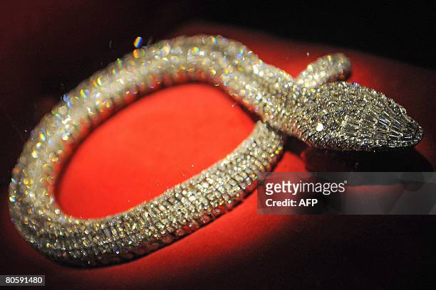This picture taken on April 10 in Antwerp shows shows a snake necklace worn by Maria Felix, a Mexican diva, displayed at 'Diamond Divas' exhibition...