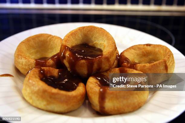 Baking tray full of Yorkshire puddings, whose makers could win the same special protection afforded to Champagne and Parma ham producers to stop...