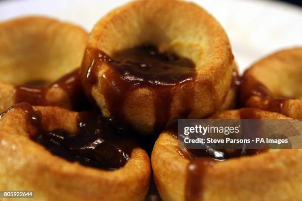 Baking tray full of Yorkshire puddings, whose makers could win the same special protection afforded to Champagne and Parma ham producers to stop...