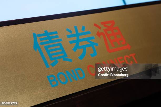 Signage for the China-Hong Kong Bond Connect is seen at the Hong Kong Stock Exchange in Hong Kong, China on Monday, July 3, 2017. The first day...