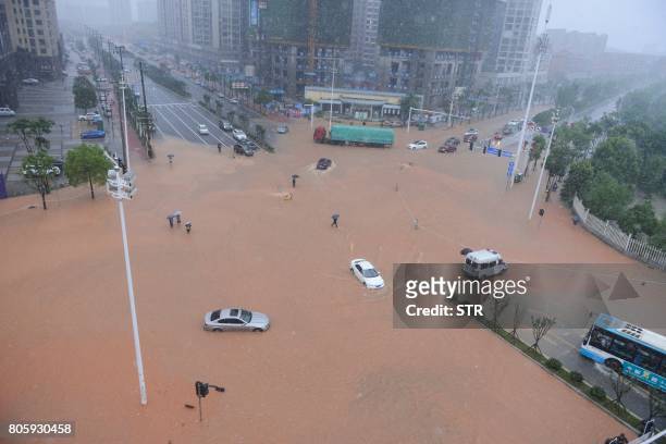 This picture taken on July 2, 2017 shows an aerial view of a flooded street in Changsha, Hunan province. - Days of torrential rain in Hunan province...
