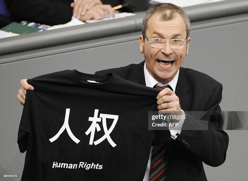 Human Rights speaker of the German Greens party, Volker Beck, holds a ...