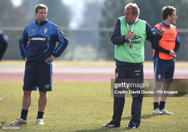 Sweden manager Erik Hamren with captain Anders Svensson during the training session at the University Training Pitch, Cardiff.