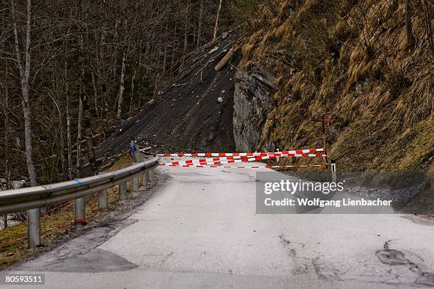 The street between the city of Embach and Dienten is seen partly destroyed and covered with debris after an approximately sixty meter long landslide...