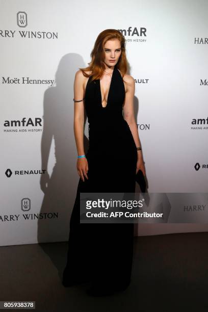 Model Alexina Graham poses during a photocall, as part of a dinner organized by the foundation for AIDS research amfAR on July 2, 2017 at the Grand...