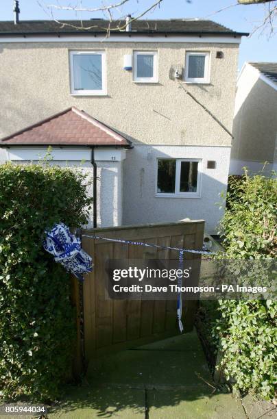 General view of a house in the Hattersley area of Greater Manchester after a 64-year-old man was found dead outside a house by police last night...