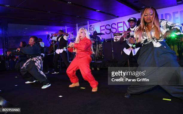 Tamika Scott, Kandi Burruss, Tameka 'Tiny' Harris, and LaTocha Scott of Xscape perform in concert at 2017 Essence Festival at Mercedes-Benz Superdome...