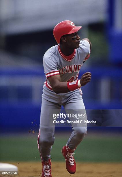 Eric Davis of the Cincinnati Reds runs to third base during a game against the New York Mets on June 30, 1990 in Flushing, New York.