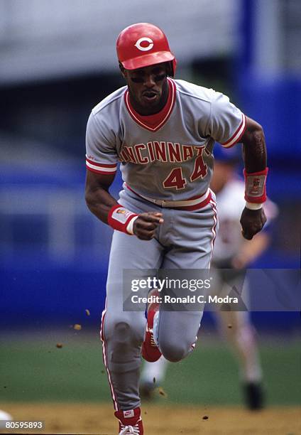 Eric Davis of the Cincinnati Reds runs to third base during a game against the New York Mets on June 30, 1990 in Flushing, New York.