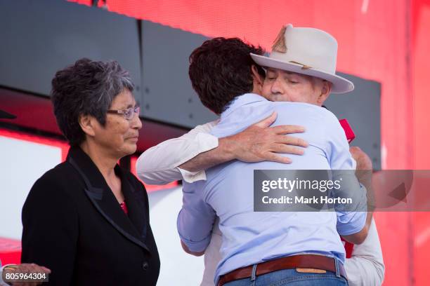 Pearl Wenjack looks on as Prime Minister of Canada Justin Trudeau greets Gord Downie at We Day Canada at Parliament Hill on July 2, 2017 in Ottawa,...