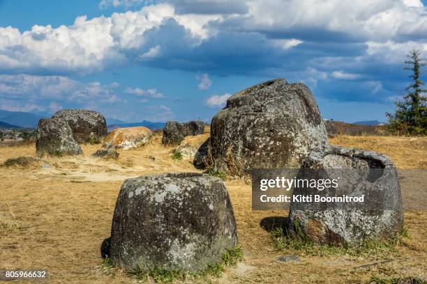 plenty of rock jars at the plain of jars in laos - plain of jars stock pictures, royalty-free photos & images