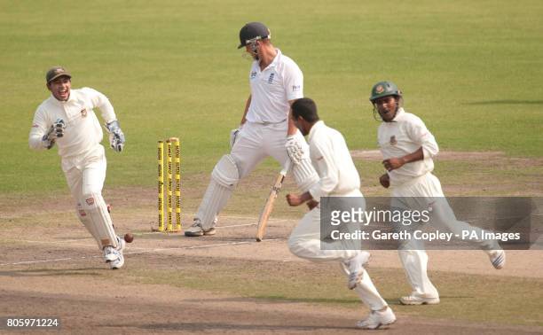 Bangladesh's Shakib Al Hasan celebrates the wicket of England's Jonathan Trott during the second test at the Shere Bangla National Stadium, Mirpur,...