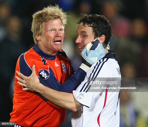 Oliver Kahn , keeper of Bayern Munich, celebrates winning the match with his team mate Mark van Bommel after the UEFA Cup quarter final second leg...