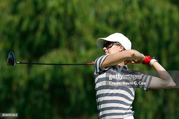 Anna Rawson of Australia tees off the fourth hole during the first round of the Corona Championship at Tres Marias Club de Golf April 10, 2008 in...