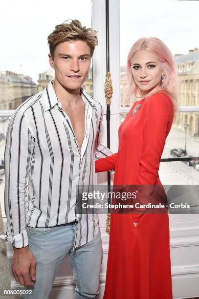 Pixie Lott and boyfriend Model Oliver Cheshire attend the Schiaparelli Haute Couture Fall/Winter 2017-2018 show as part of Haute Couture Paris...
