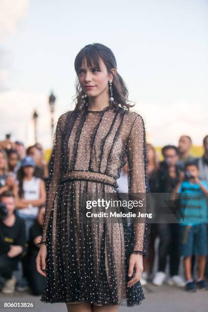 Stacy Martin outside the Miu Miu Cruise 2018 show on July 2, 2017 in Paris, France.