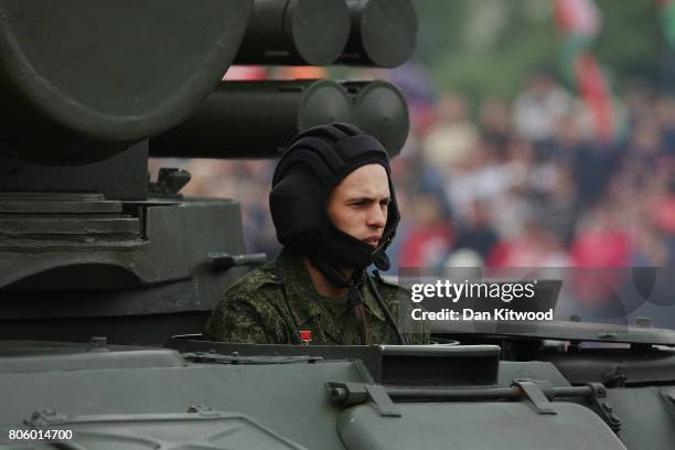 Tanks roll past Belarusian President Alexander Lukashenko during the Independence Day Parade on July 3, 2017 in Minsk, Belarus. The parade included...