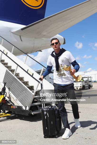 Julian Draxler of Germany arrives with his team at Frankfurt am Main International Airport on July 3, 2017 in Frankfurt am Main, Germany.