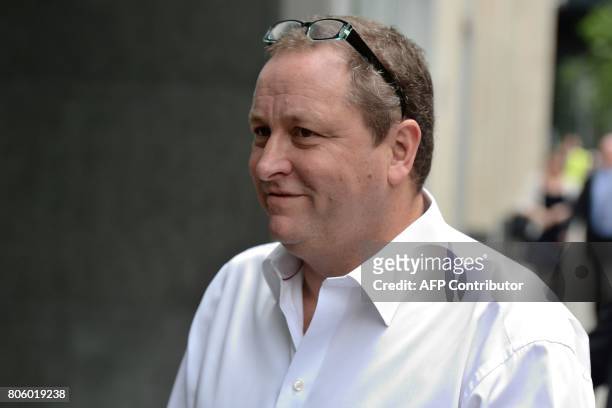 Owner of Sports Direct and Newcastle United, Mike Ashley arrives at the High Court in central London on July 3 to defend himself against a lawsuit...