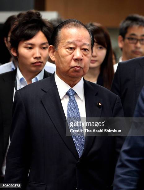Ruling Liberal Democratic Party Lower House secretary general Toshihiro Nikai is seen as the vote counting continues in the Tokyo Assembly electioon...