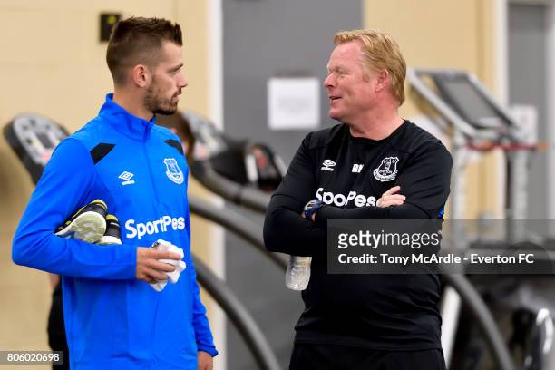 Morgan Schneiderlin of Everton chats to Ronald Koeman as he returns to training at USM Finch Farm on July 3, 2017 in Halewood, England.