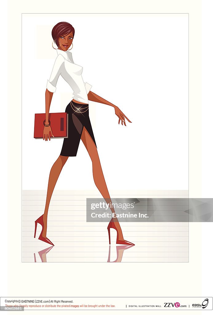 Side profile of a businesswoman holding a file