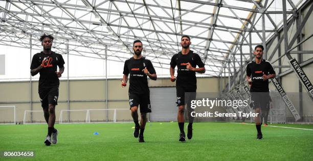 Newcastle players seen L-R Rolando Aarons, Jesus Gamez, Achraf Lazaar and Ayoze Perez jog during the Newcastle United Training Session at the...